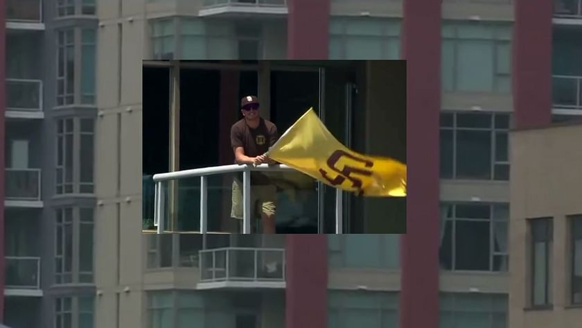 Padres Fan Waves Flag In East Village 