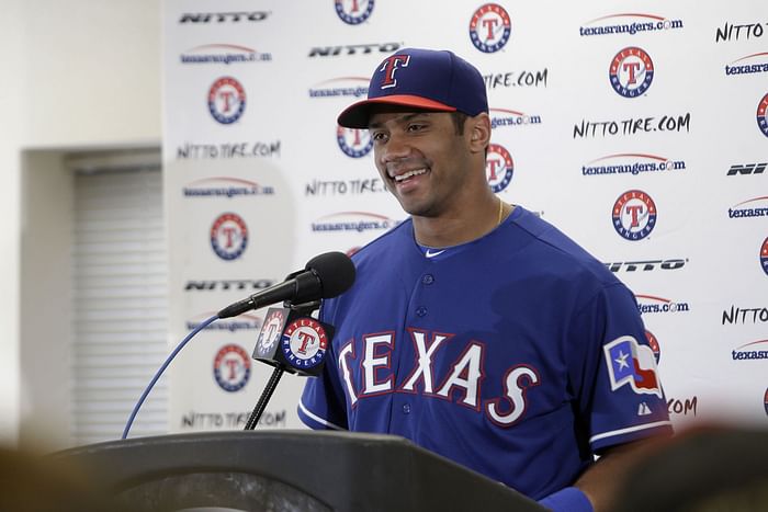 Rangers trade QB-infielder Russell Wilson to Yankees