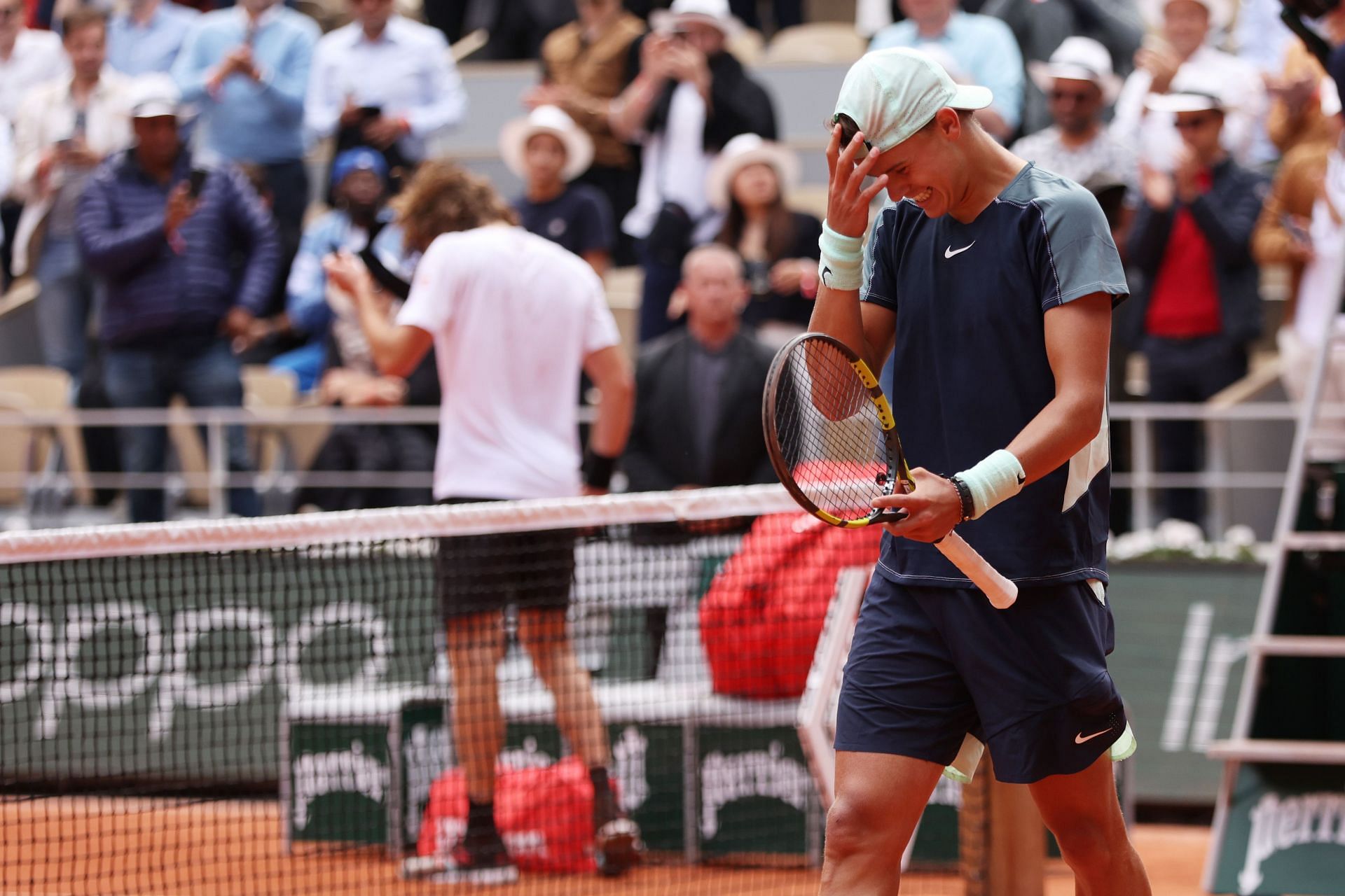 Holger Rune celebrates his win against fourth seed Stefanos Tsitsipas at the 2022 French Open