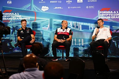 Guenther Steiner (right) is not entirely on board with Christian Horner's (left) concerns with the cost cap