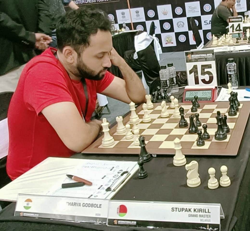 Indian chess player Atharva Godbole (L) beat GM Kiril Stupak of Belarus in the second round. (Pic credit: AICF)