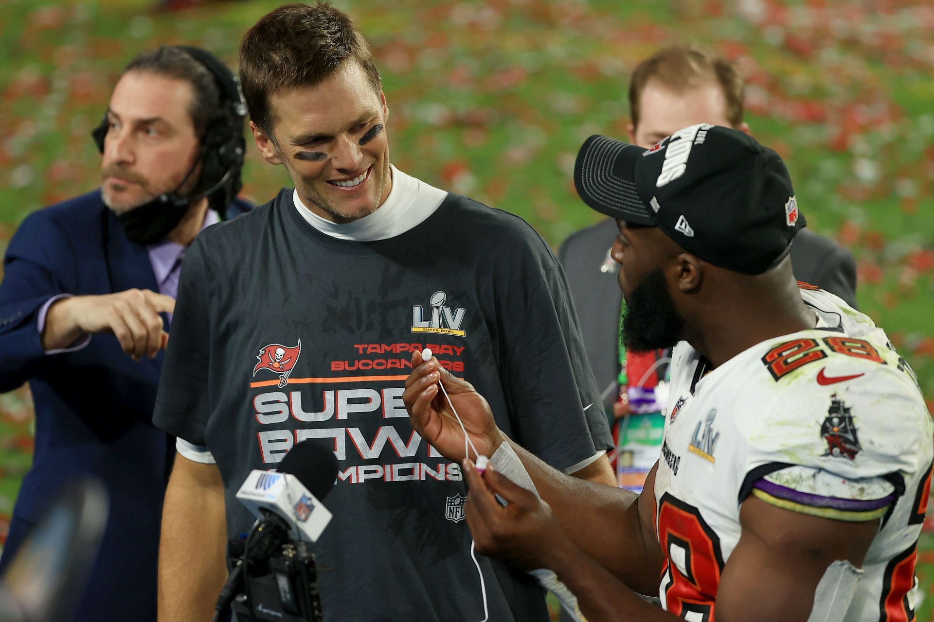 Tom Brady and Leonard Fournette after Super Bowl LV.