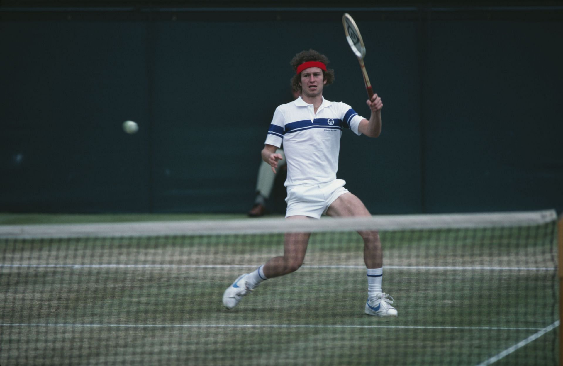 John McEnroe won three titles at the grasscourt major.