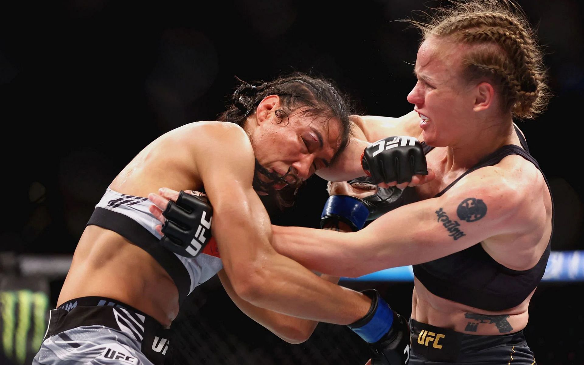 Taila Santos and Valentina Shevchenko in action during their co-main event clash at UFC 275