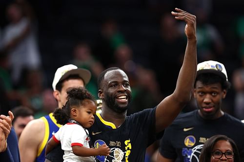 2022 NBA Finals, Game Six; Draymond Green with his daughter celebrating the championship.