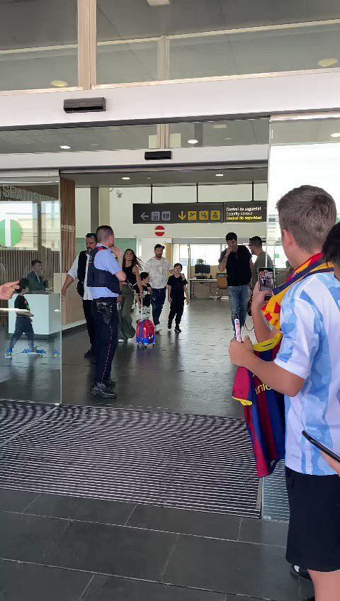 Watch as PSG star Lionel Messi returns to Barcelona with family and is  greeted by adoring fans at airport