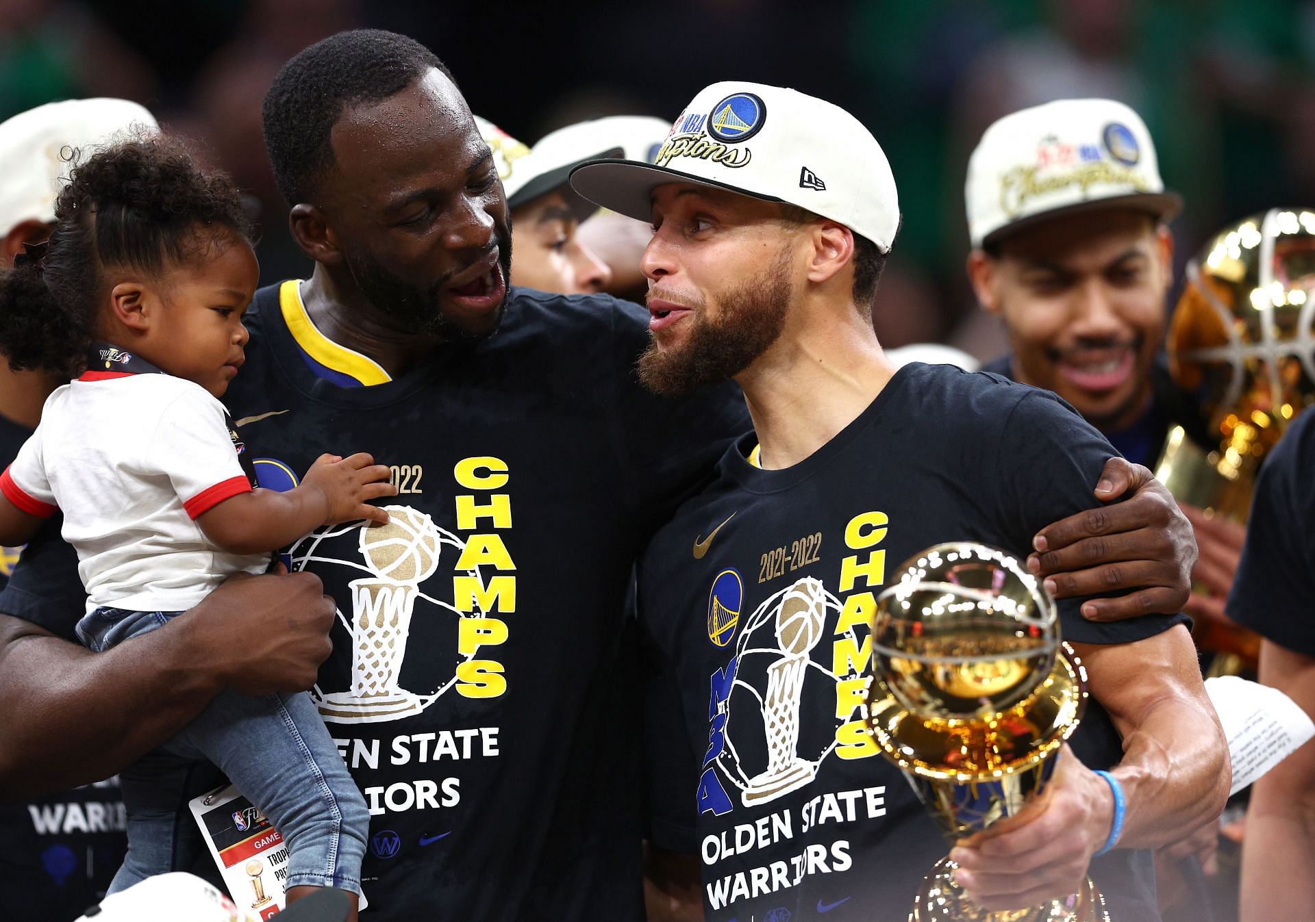 Draymond Green and Steph Curry celebrate winning the 2022 Finals