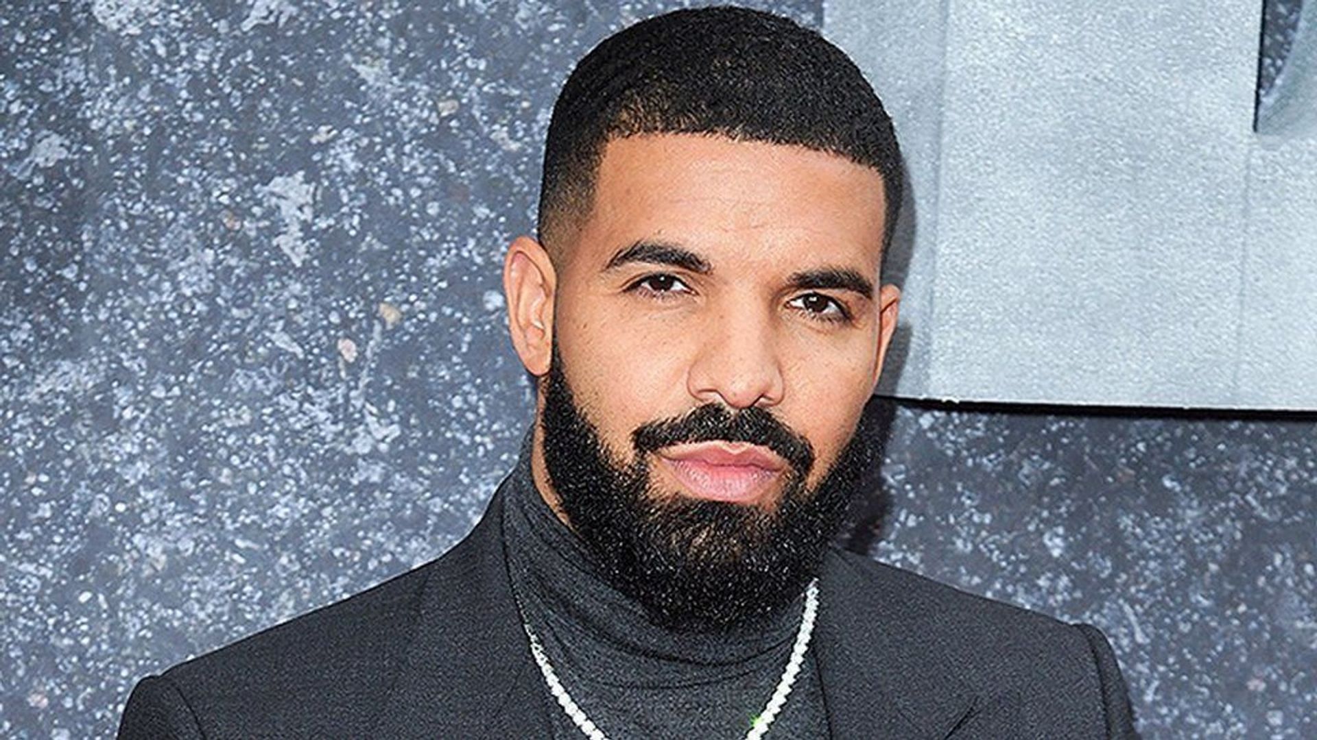 Drake photoshops Addison Rae&#039;s hands into an Instagram post (Image via Getty Images)