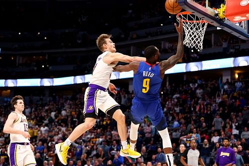 Mac McClung contesting a Denver Nuggets layup