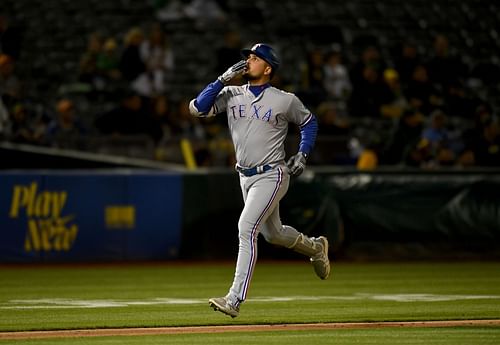 Lowe hits a homer - Texas Rangers v Oakland Athletics