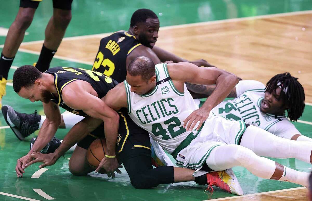 Steph Curry, Al Horford, Draymond Green and Robert Williams III dive after a loose ball [Photo source San Francisco Chronicle]
