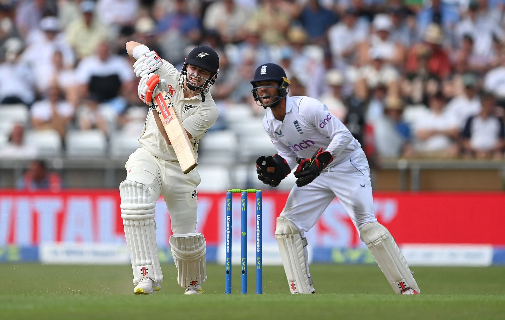 Henry Nicholls drives as Ben Foakes looks on. (Image Credits: Twitter)