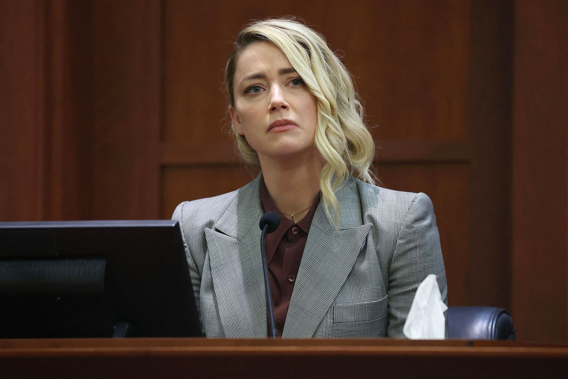 Amber Heard in the trial (Image via Michael Reynolds/Pool/AFP/Getty Images)