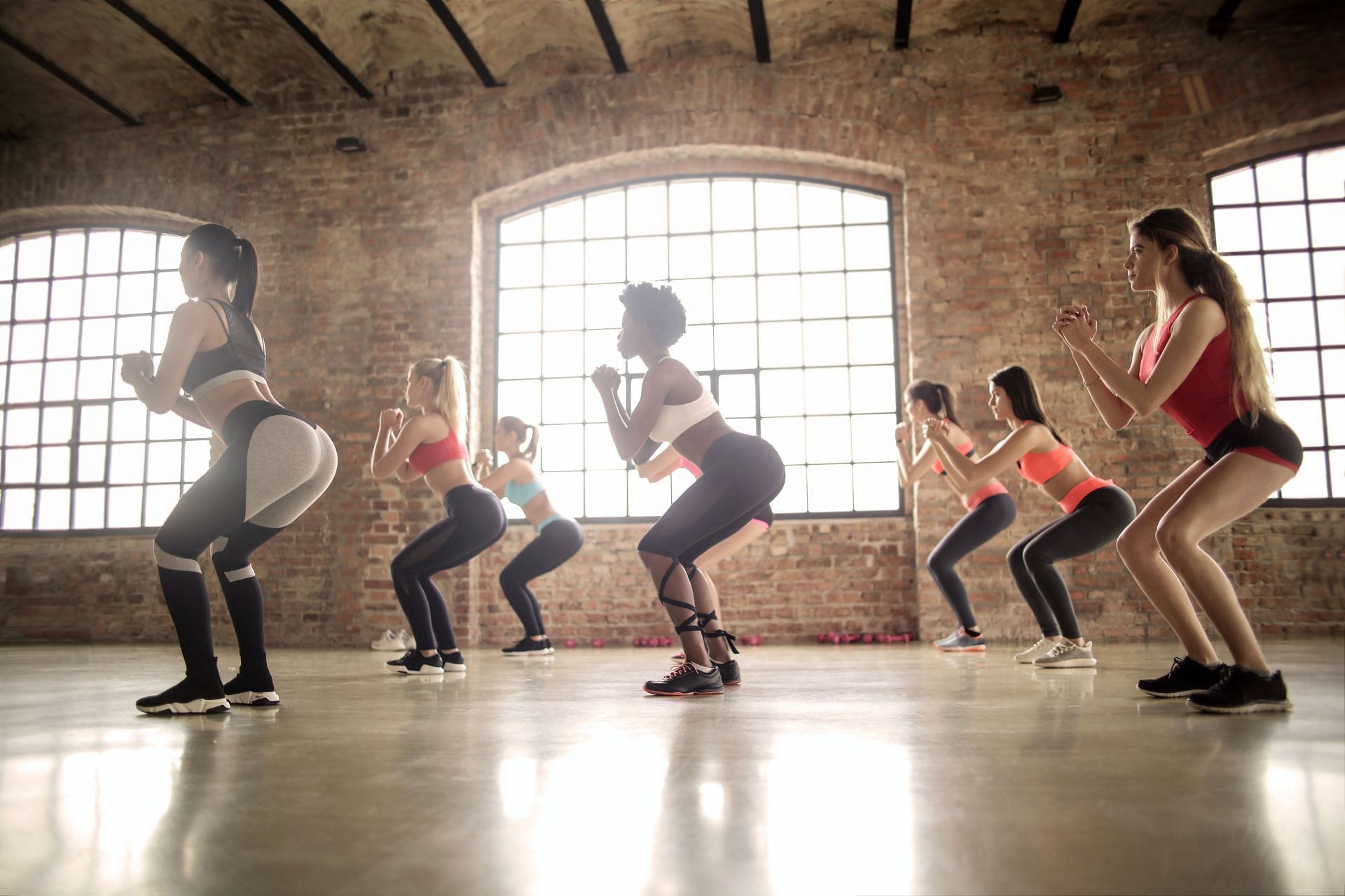 Squats are great for strengthening your glutes, quads, hamstrings, and core (Image via Pexels @Andrea Piacquadio)