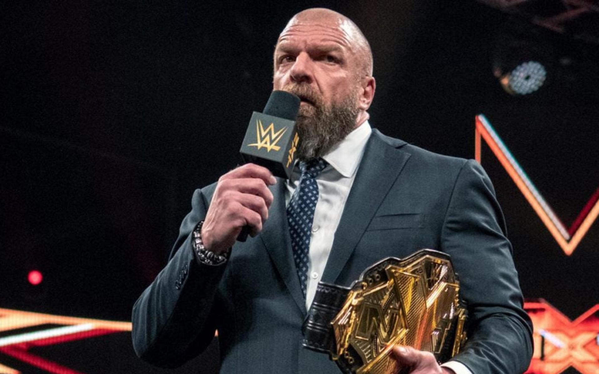 Triple H with the NXT Championship