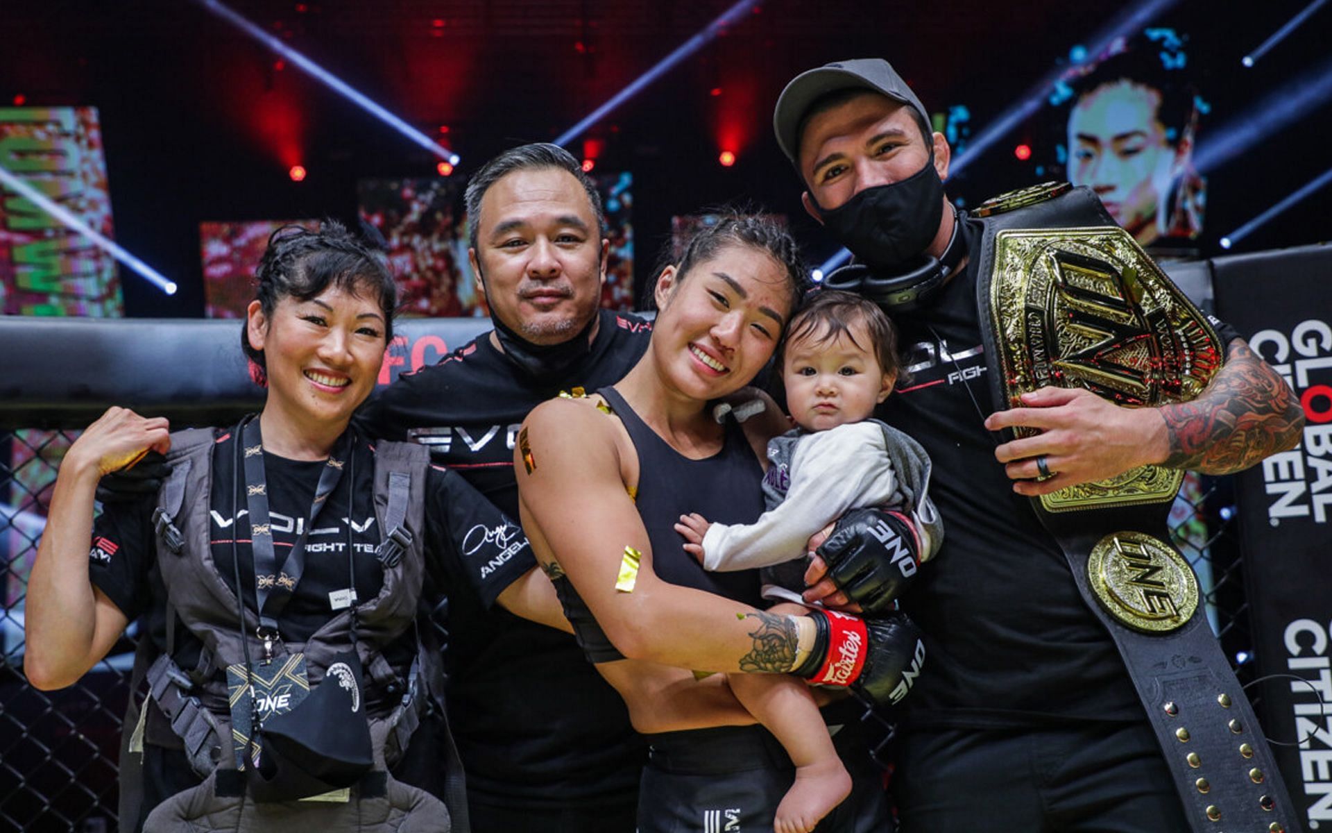 Angela Lee (2nd from R) is joined by her husband, Bruno Pucci (R), and father, Ken (2nd from L). | [Photo: ONE Championship]