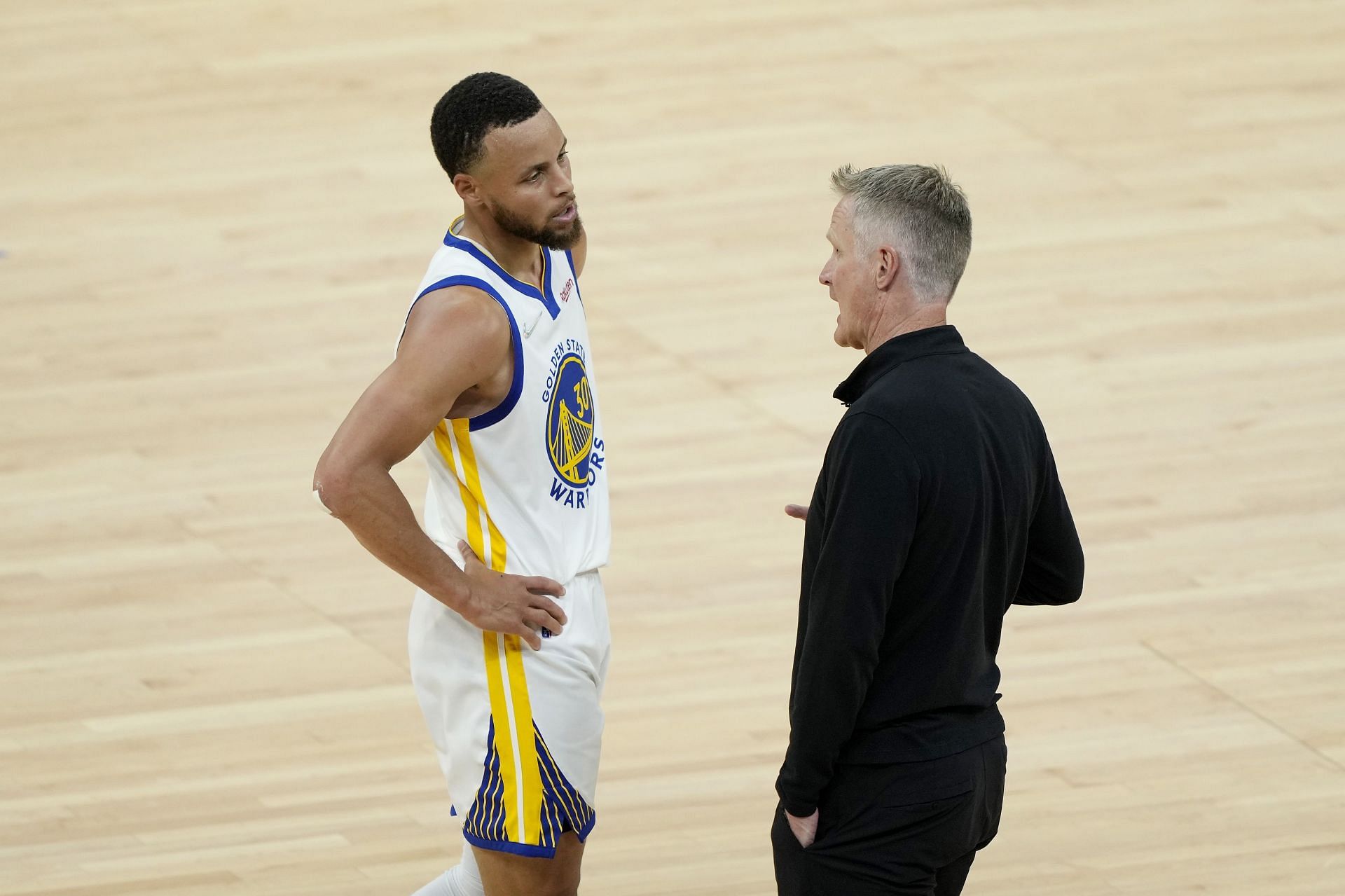 Stephen Curry, left, and Steve Kerr, right.