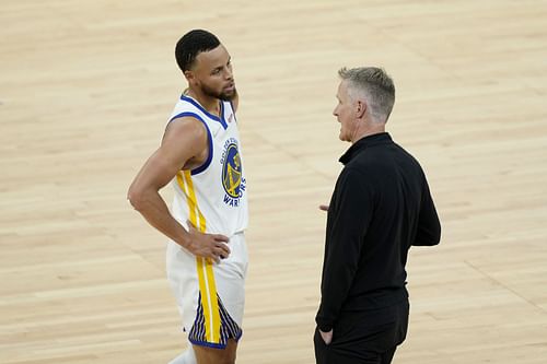 Stephen Curry, left, and Steve Kerr, right.