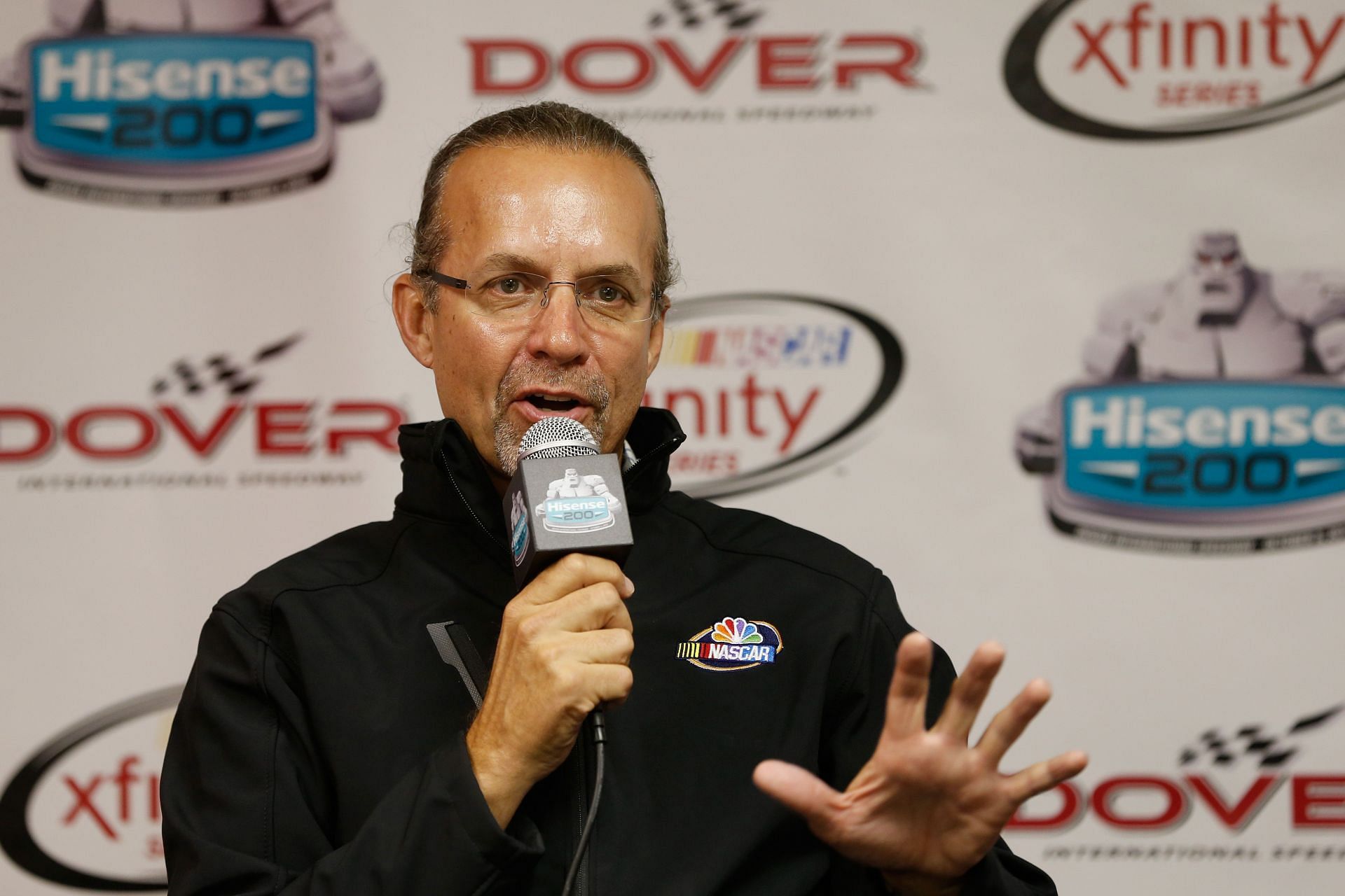 Former NASCAR driver and television personality Kyle Petty speaks with the media at a press conference prior to the NASCAR XFINITY Series Hisense 200 at Dover International Speedway