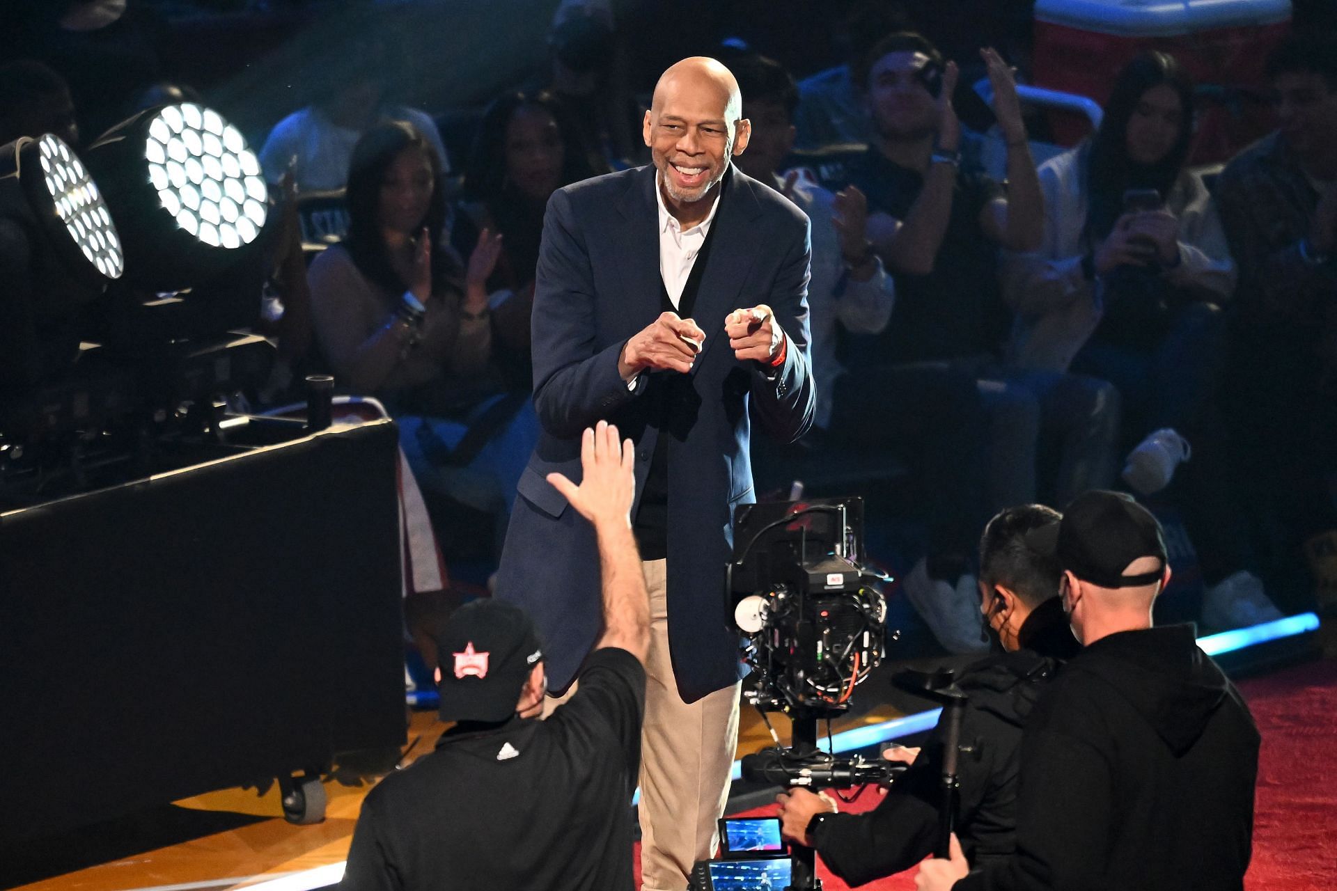 Kareem Abdul-Jabbar reacts after being introduced as part of the NBA 75th Anniversary Team.