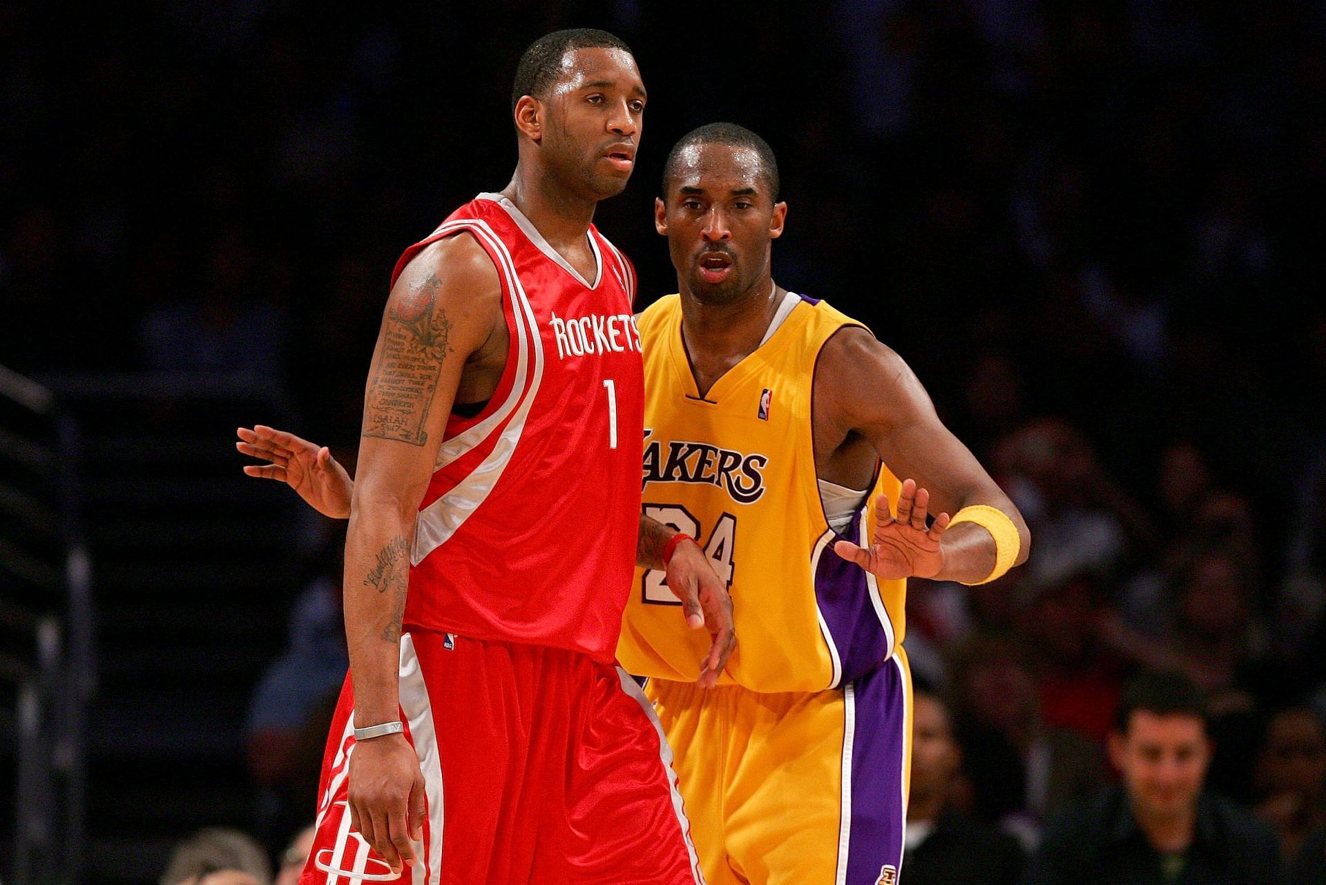 Tracy McGrady and Kobe Bryant in action.