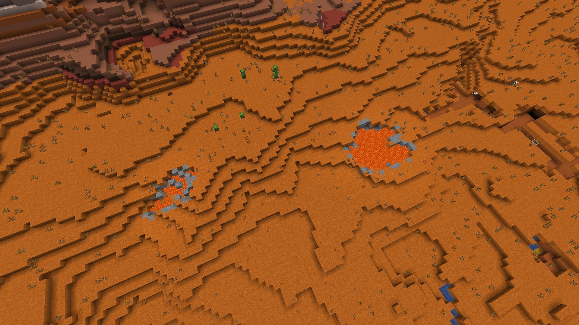 The nearby badlands biome&#039;s lava pools (Image via Minecraft)