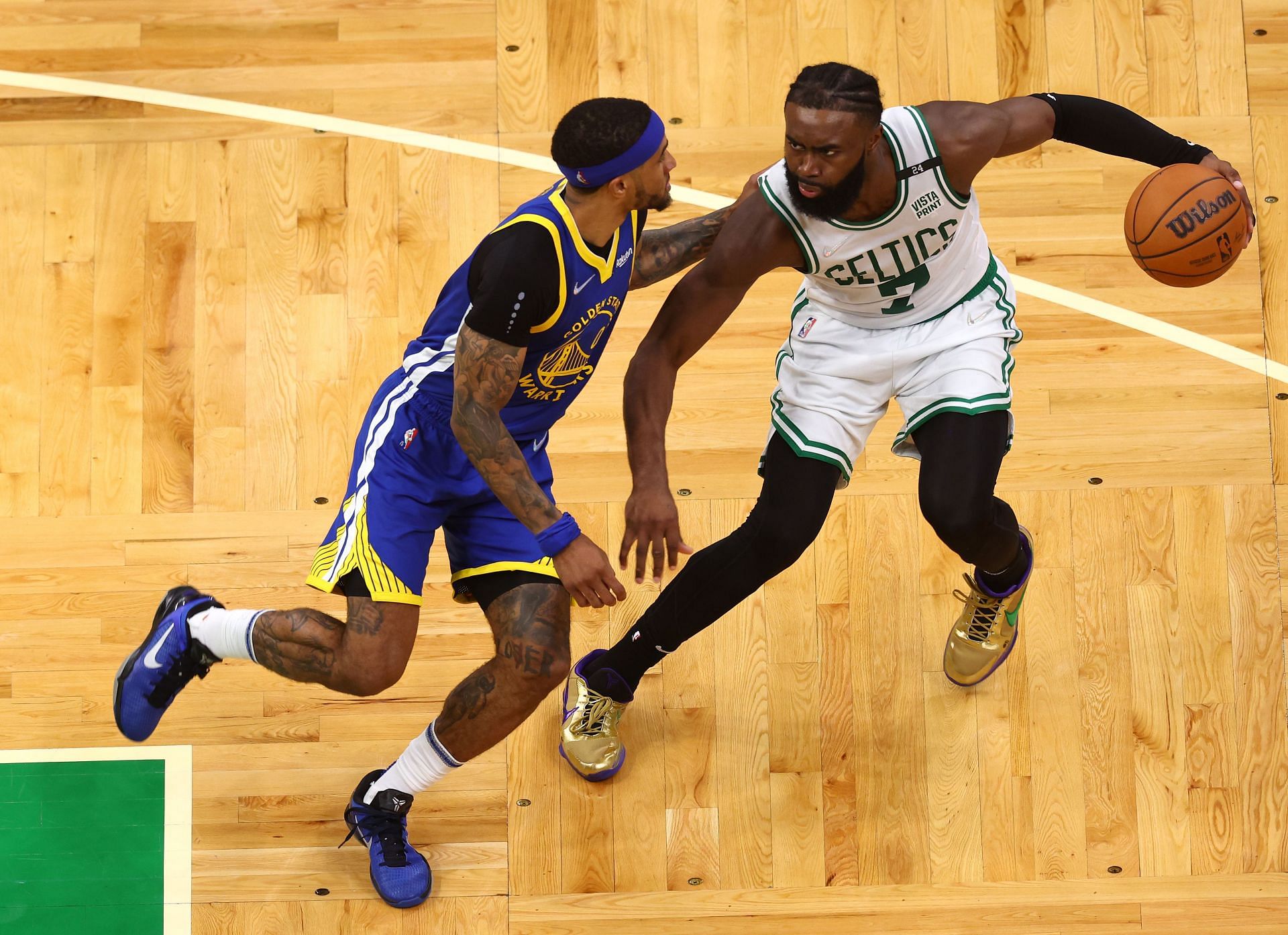 Gary Payton II guards Jaylen Brown