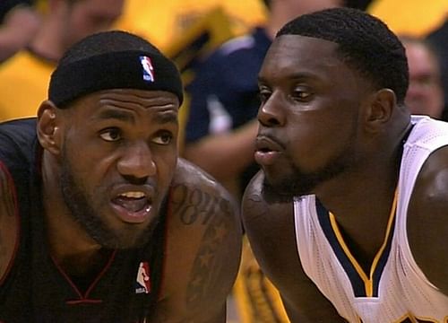 Lance Stephenson blows in LeBron James' ear during the 2014 NBA playoffs [Photo Source Sports Illustrated]