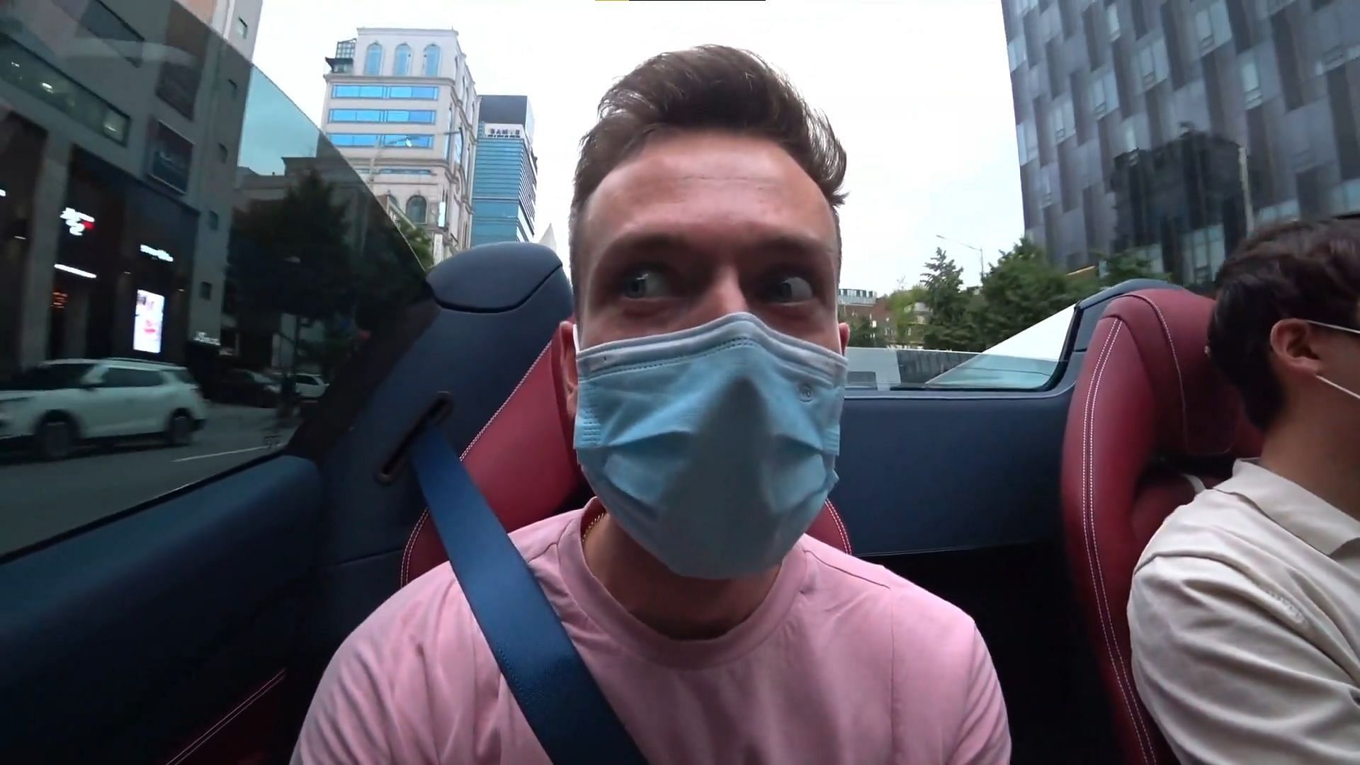 JakenBake looking nervous in a speeding car in Korea (Image via jakenbakeLIVE/Twitch)