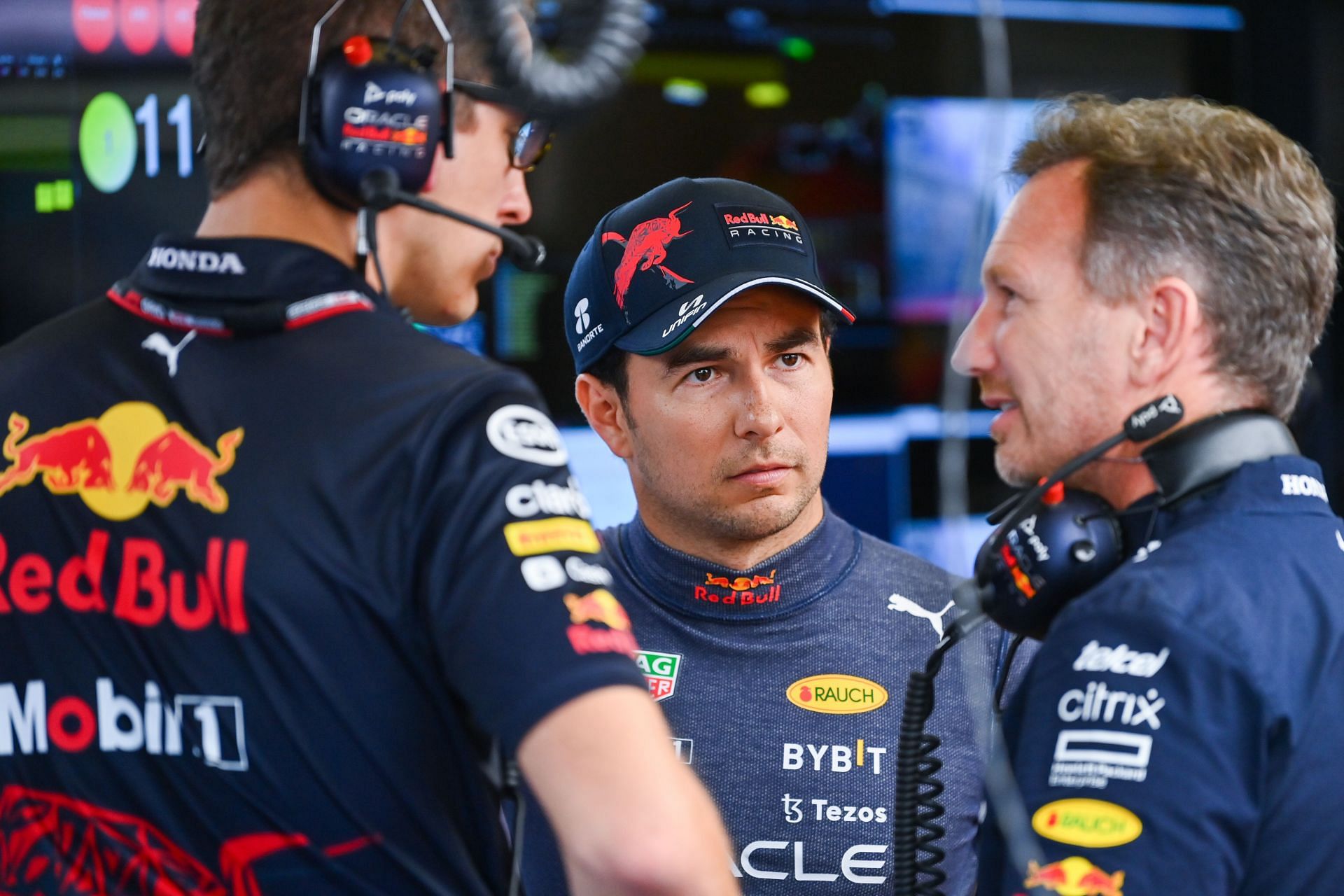 Sergio Perez (middle) and Christian Horner (right) during the F1 Grand Prix of Azerbaijan - Final Practice