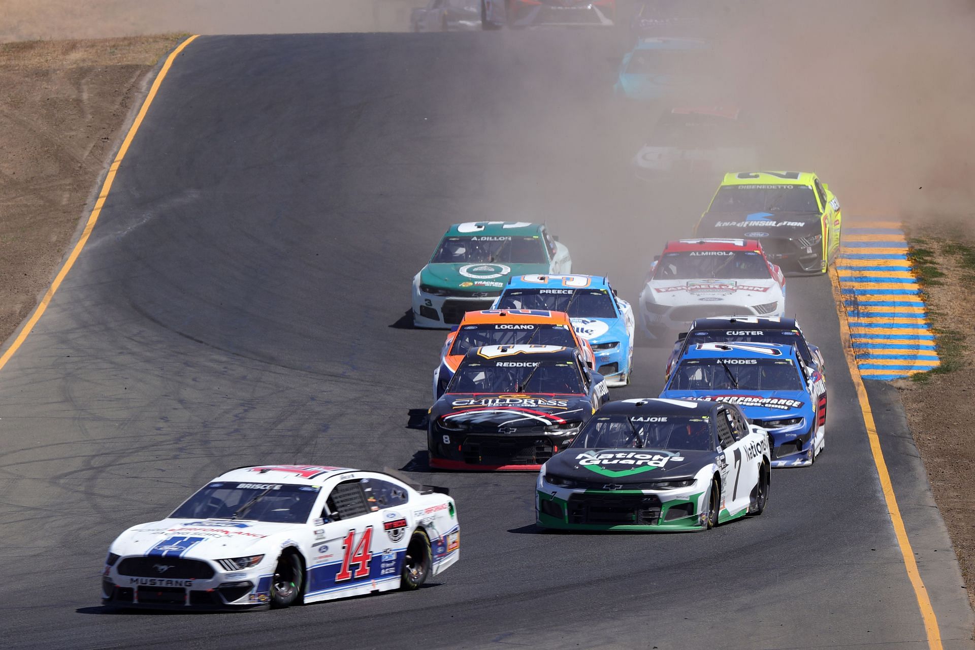 Chase Briscoe, Corey LaJoie, and Tyler Reddick race during the NASCAR Cup Series Toyota/Save Mart 350 at Sonoma Raceway (Photo by Carmen Mandato/Getty Images)