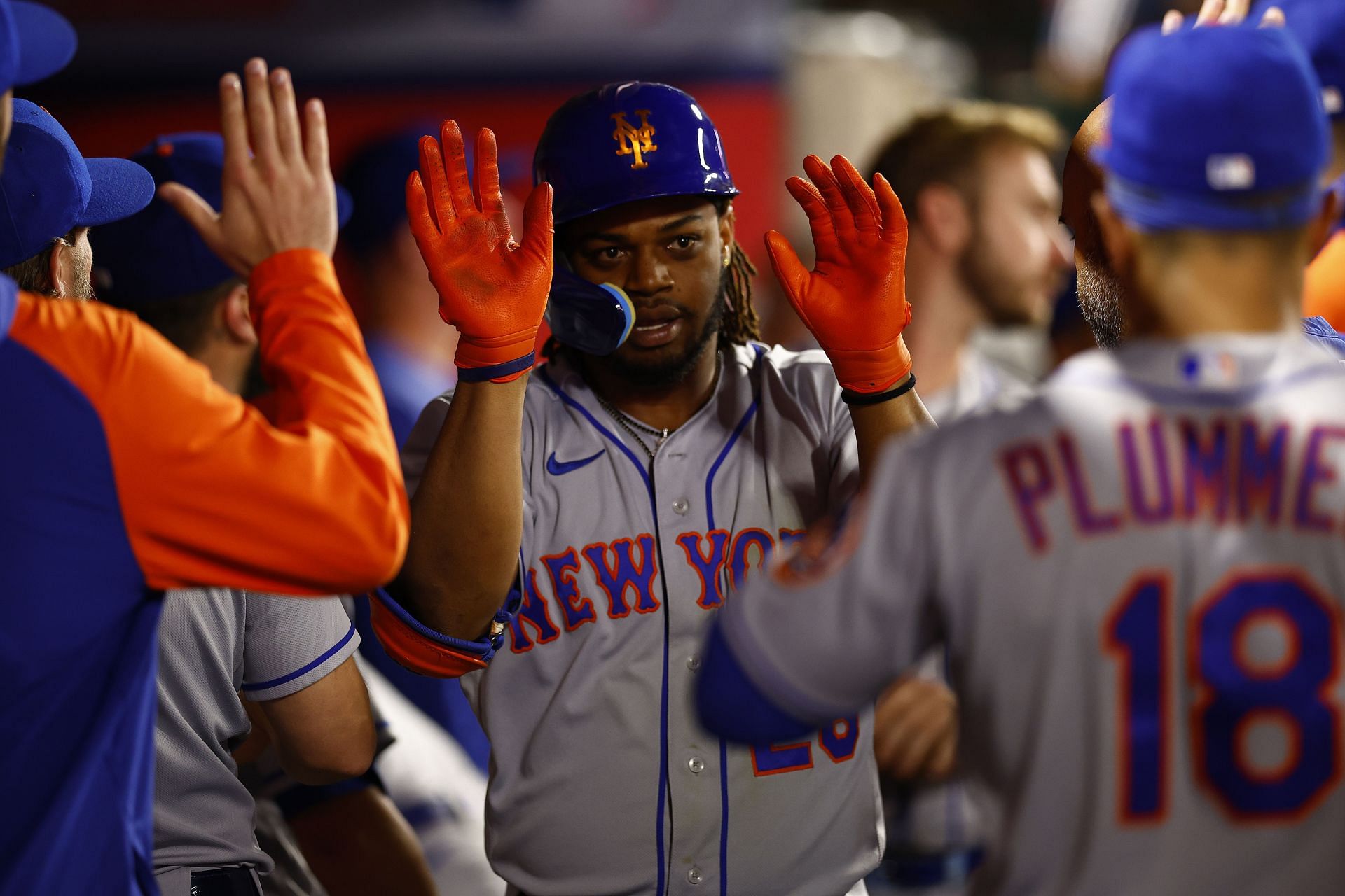 New York Mets celebrate in the dugout during a game against the Los Angeles Angels.