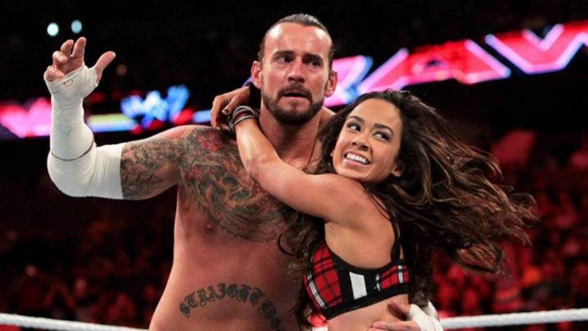 CM Punk and AJ Lee at a WWE event in 2012
