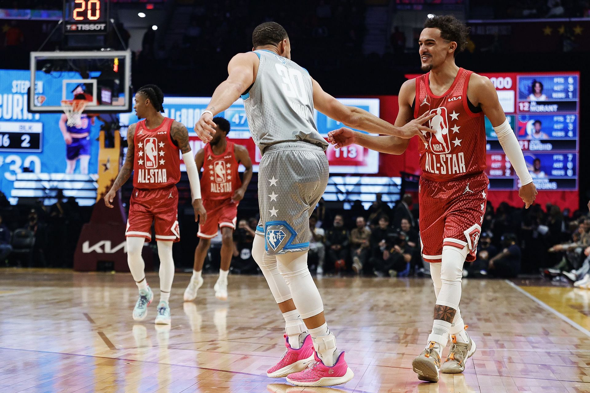 Steph Curry talks with Trae Young at the 2022 NBA All-Star Game