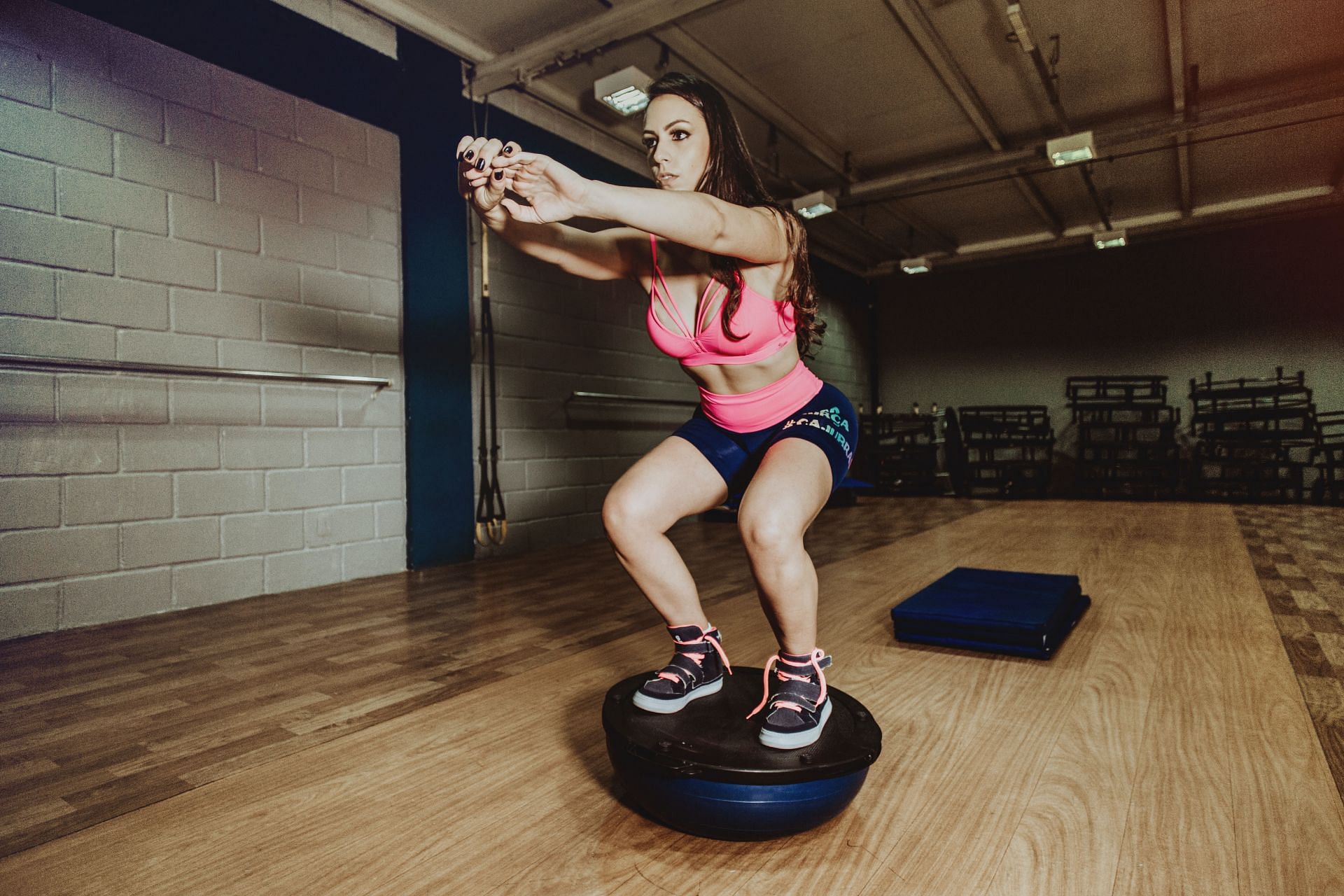 BOSU squats are a simple and effective way to increase balance and strength (Image from Pexels @Jonathan Borba)