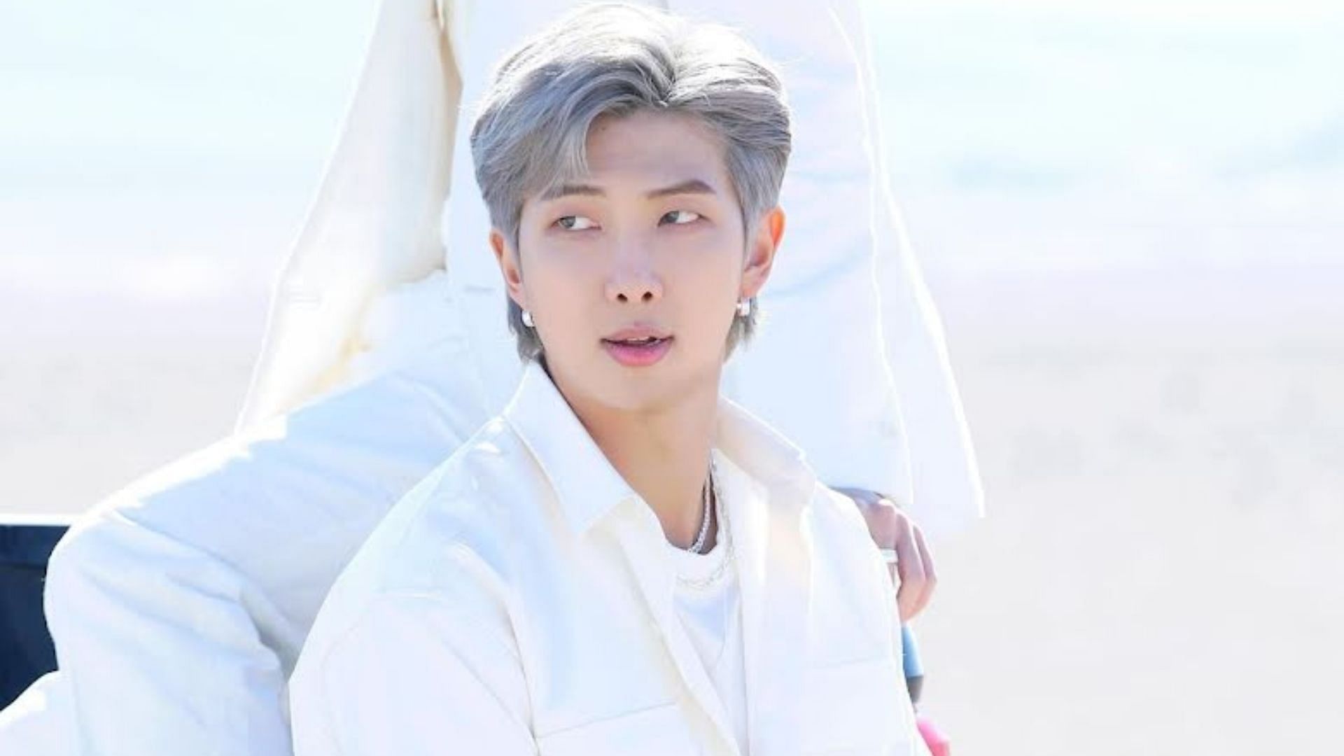 BTS&#039; RM posing for Yet to Come shooting sketch (Image via BIG HIT MUSIC)