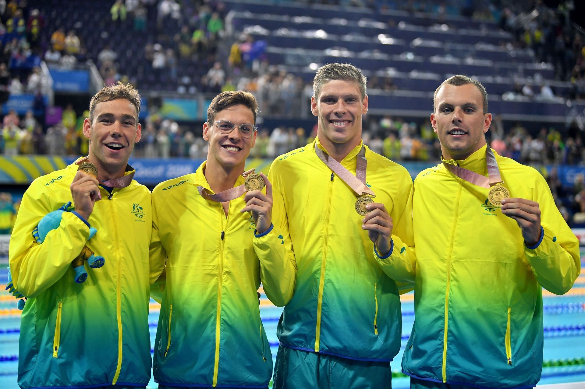 Gold medalists Mitch Larkin, Jake Packard, Grant Irvine and Kyle Chalmers of Australia during the medal ceremony for the Men&#039;s 4 x 100m Medley at the Gold Coast 2018 Commonwealth Games. (Getty Images)