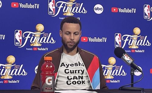 Steph Curry wears an "Ayesha Curry can cook" t-shirt for his Game 5 postgame interview.