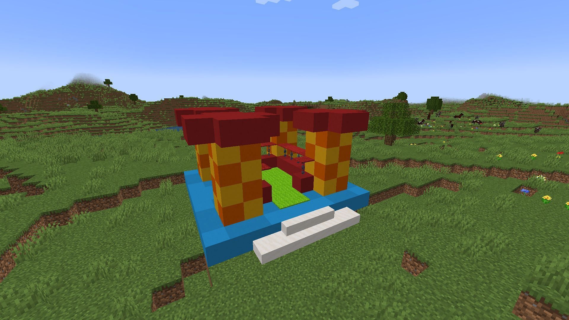 The completed bouncy house, with lime carpet covering the slime blocks (Image via Minecraft)
