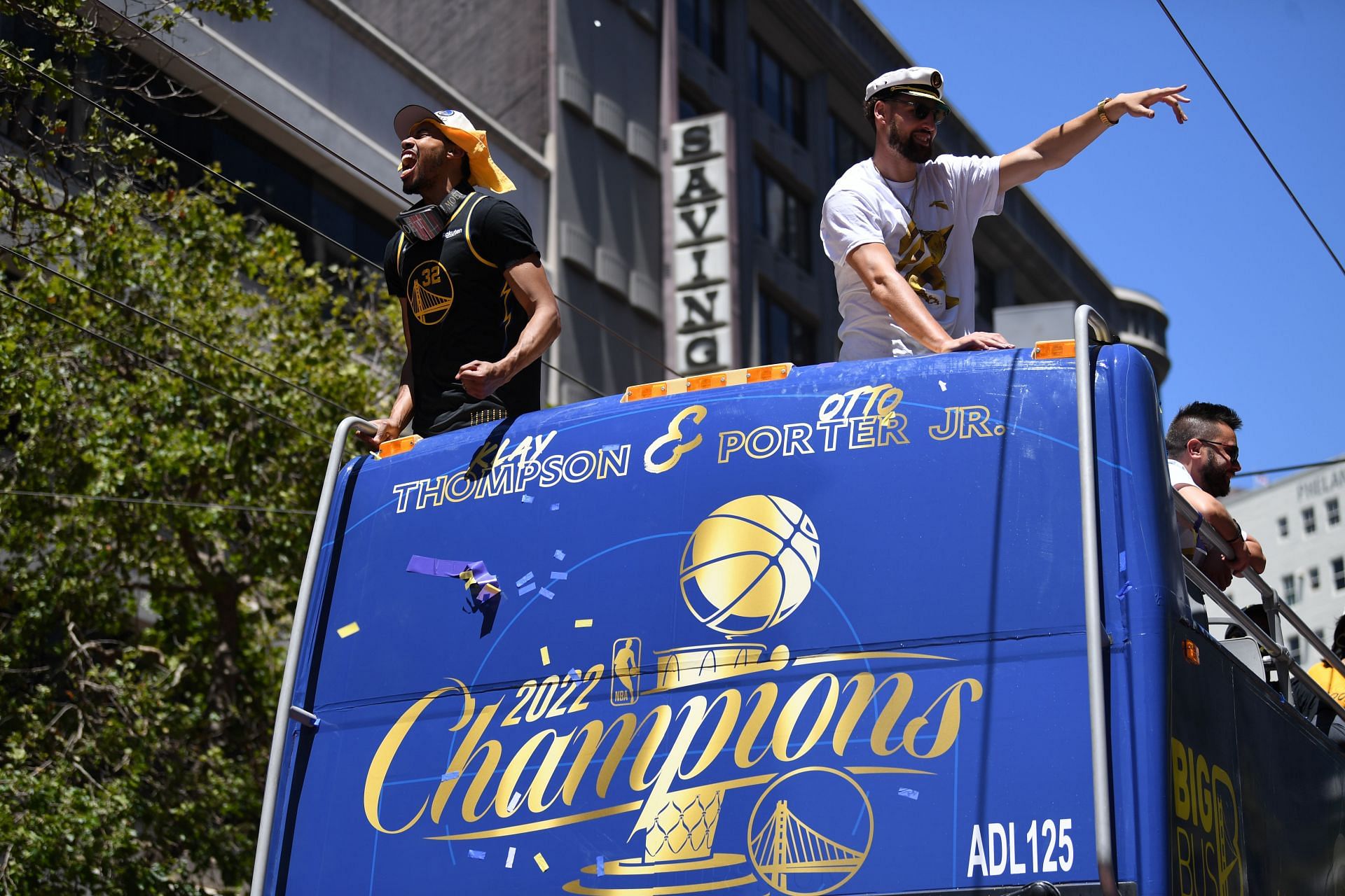 Klay Thompson and Otto Porter Jr. celebrating in their championsip parade.