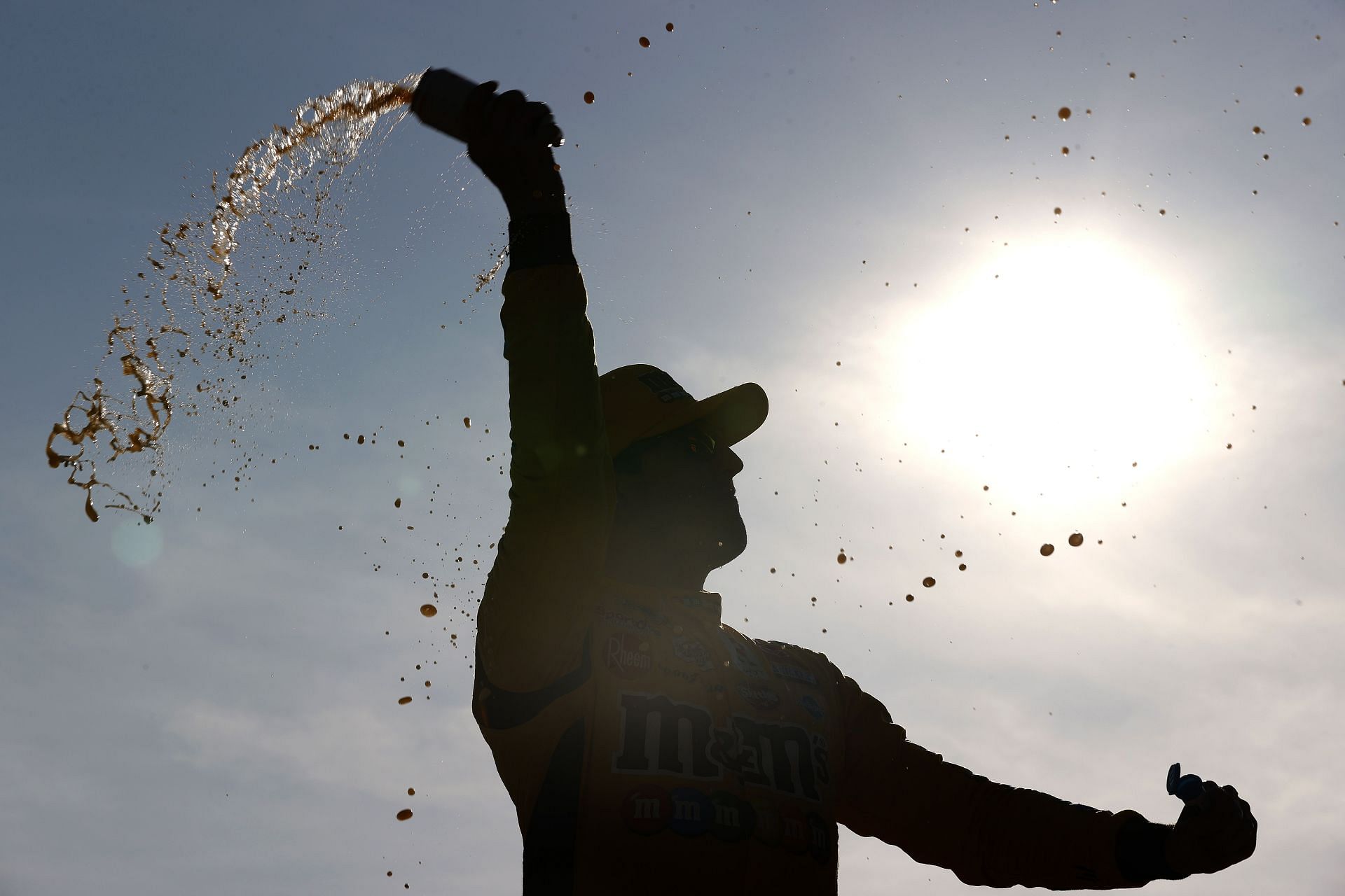 Kyle Busch celebrates in victory lane after winning the 2021 NASCAR Cup Series Explore the Pocono Mountains 350 at Pocono Raceway in Long Pond, Pennsylvania (Photo by Tim Nwachukwu/Getty Images)