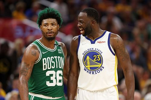 Marcus Smart, left, and Draymond Green, right