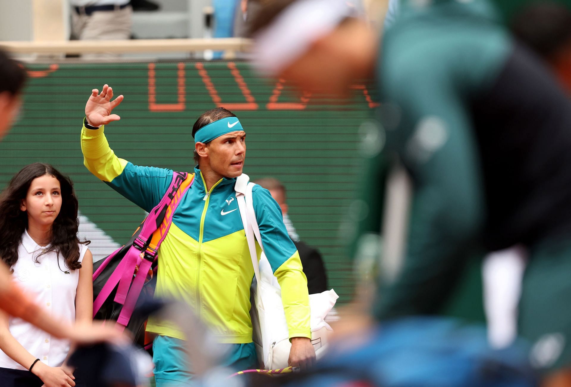 Rafael Nadal waves to the crowd at the French Open