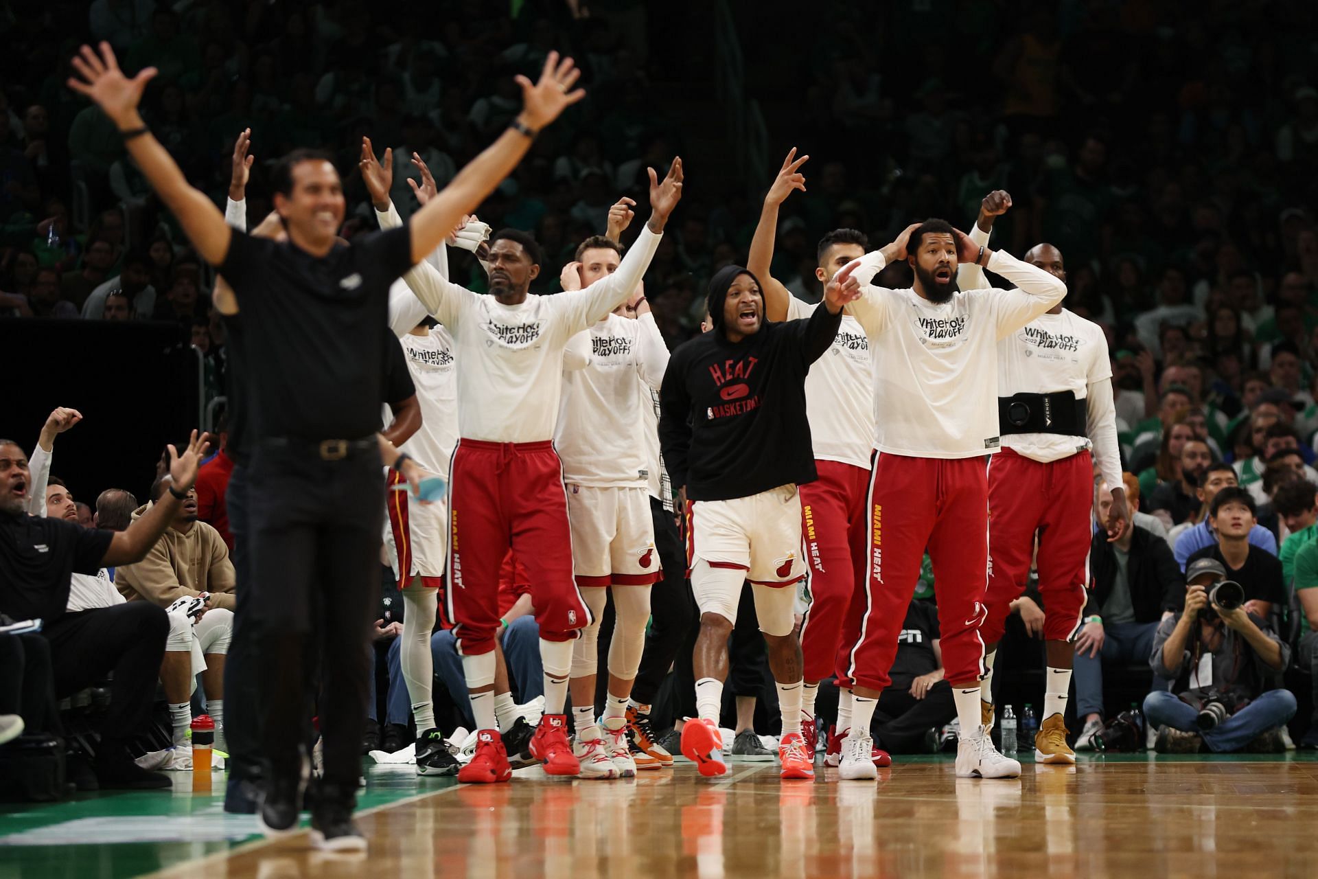 The Miami Heat bench celebrates a victory over the Boston Celtics during the 2022 Eastern Conference Finals.