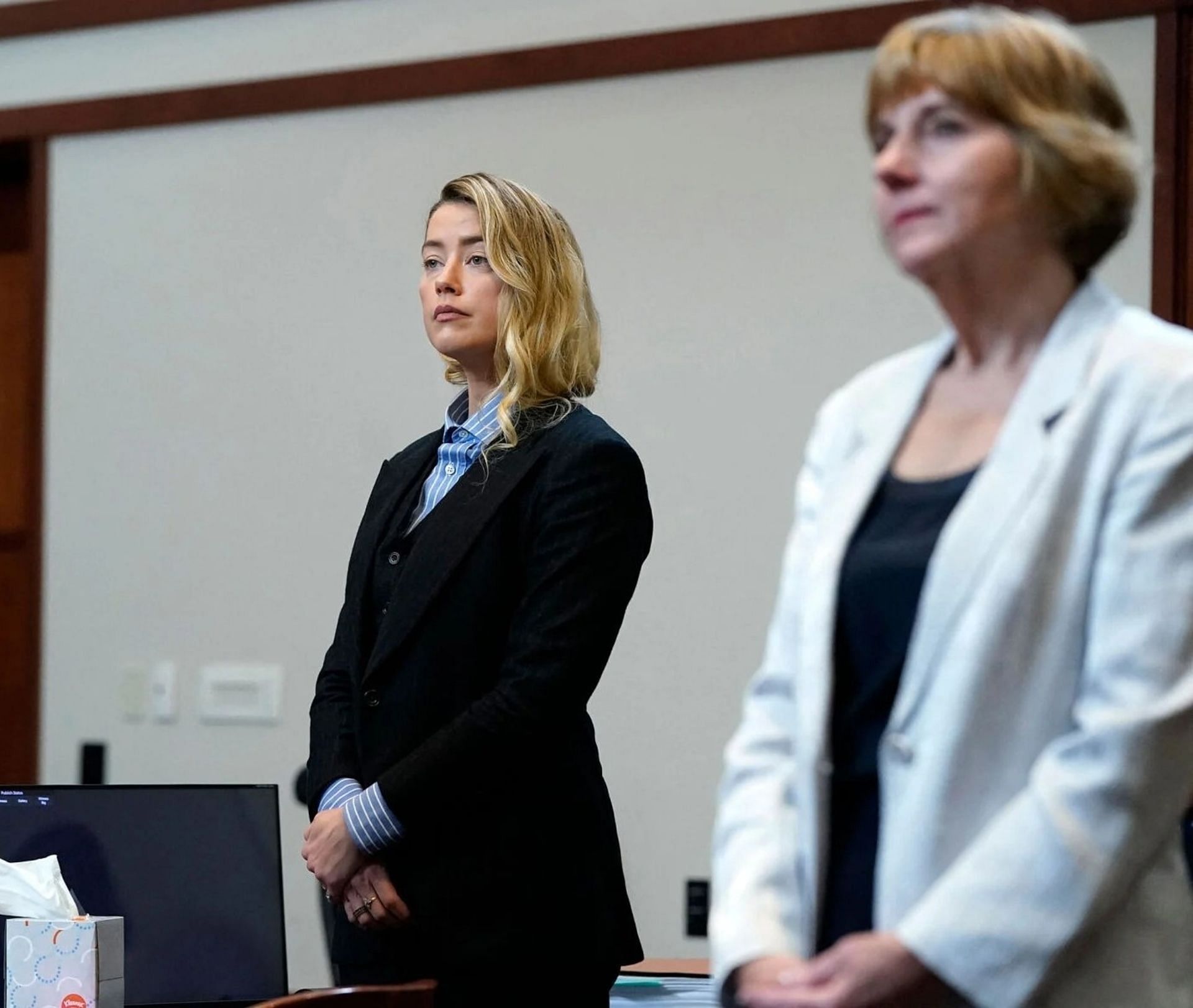 Amber Heard and Elaine Bredehoft (Image via Elizabeth Frantz/Pool/AFP/Getty Images)