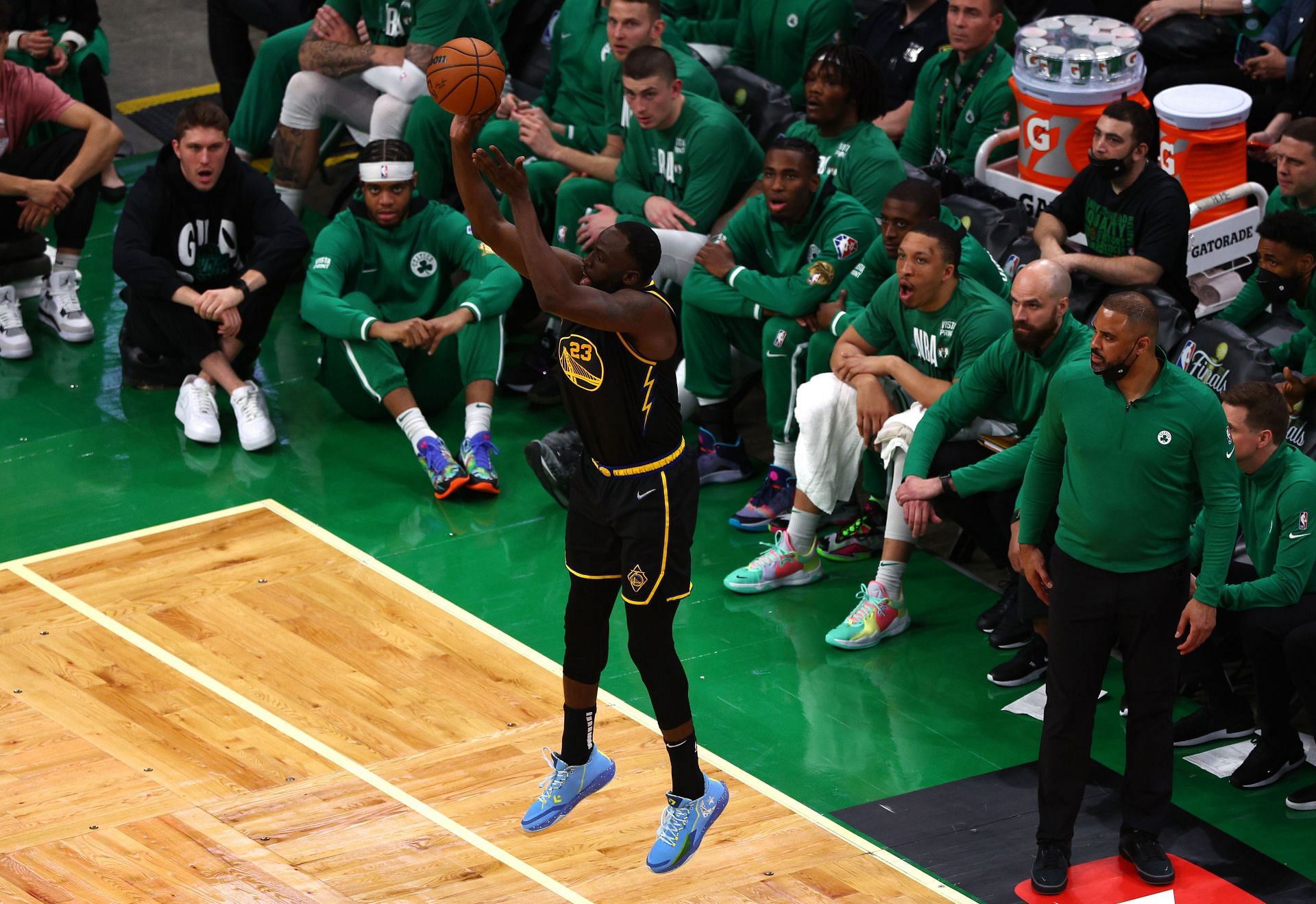 Draymond Green attempts a three-point shot