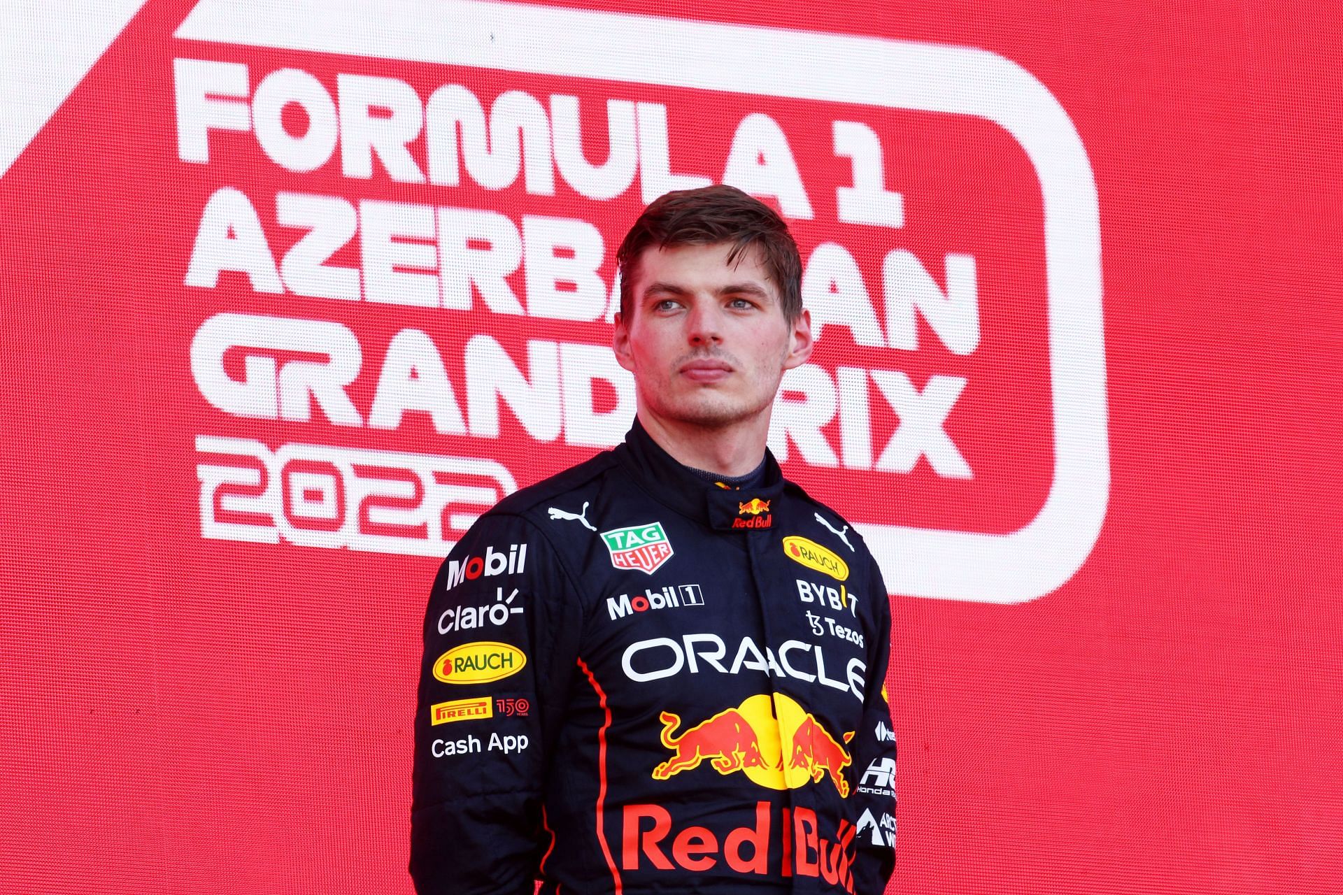 Red Bull driver Max Verstappen on the podium after winning the 2022 F1 Azerbaijan GP (Photo by Clive Rose/Getty Images)
