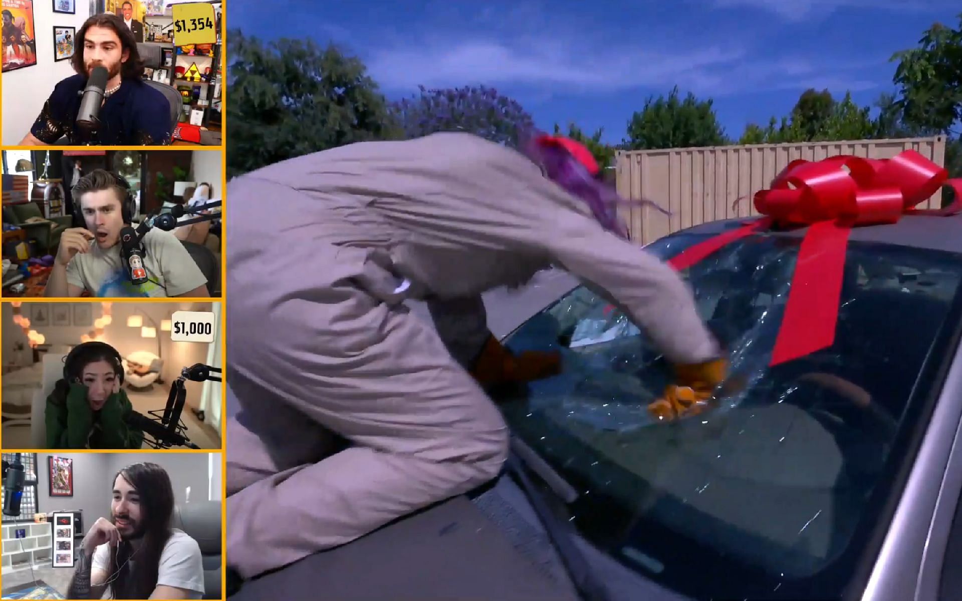 JustaMinx thrashes a car during the latest episode of Name of Your Price (Image via AustinShow/Twitch)
