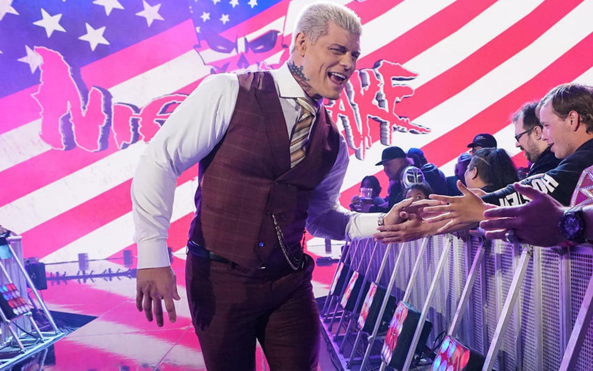 The American Nightmare greeting fans during his entrance on RAW