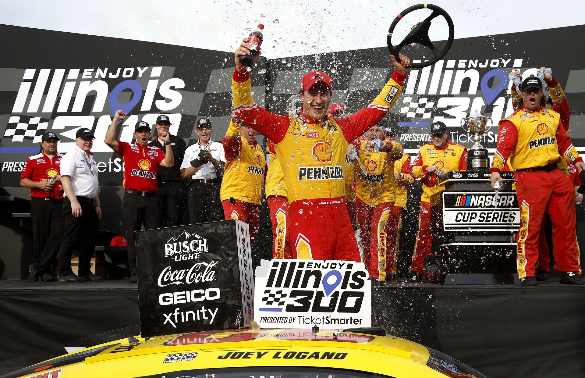 Joey Logano celebrates in victory lane after winning the NASCAR Cup Series Enjoy Illinois 300 at WWT Raceway (Photo by Sean Gardner/Getty Images)